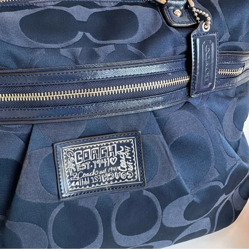 Coach “daisy signature